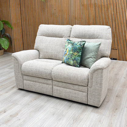 Lifestyle view of the ‘Hudson’ 2-seater sofa, emphasizing the plush lumbar support, deeply padded seat cushions, and inviting, comfortable silhouette.