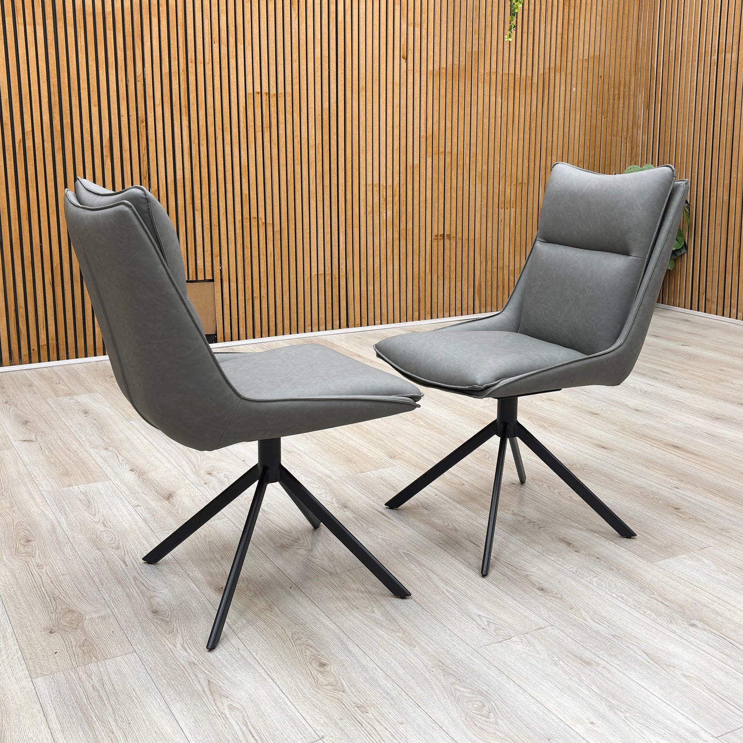 ‘Catalina’ Dark Grey Faux Leather Pair of Swivel Dining Chairs