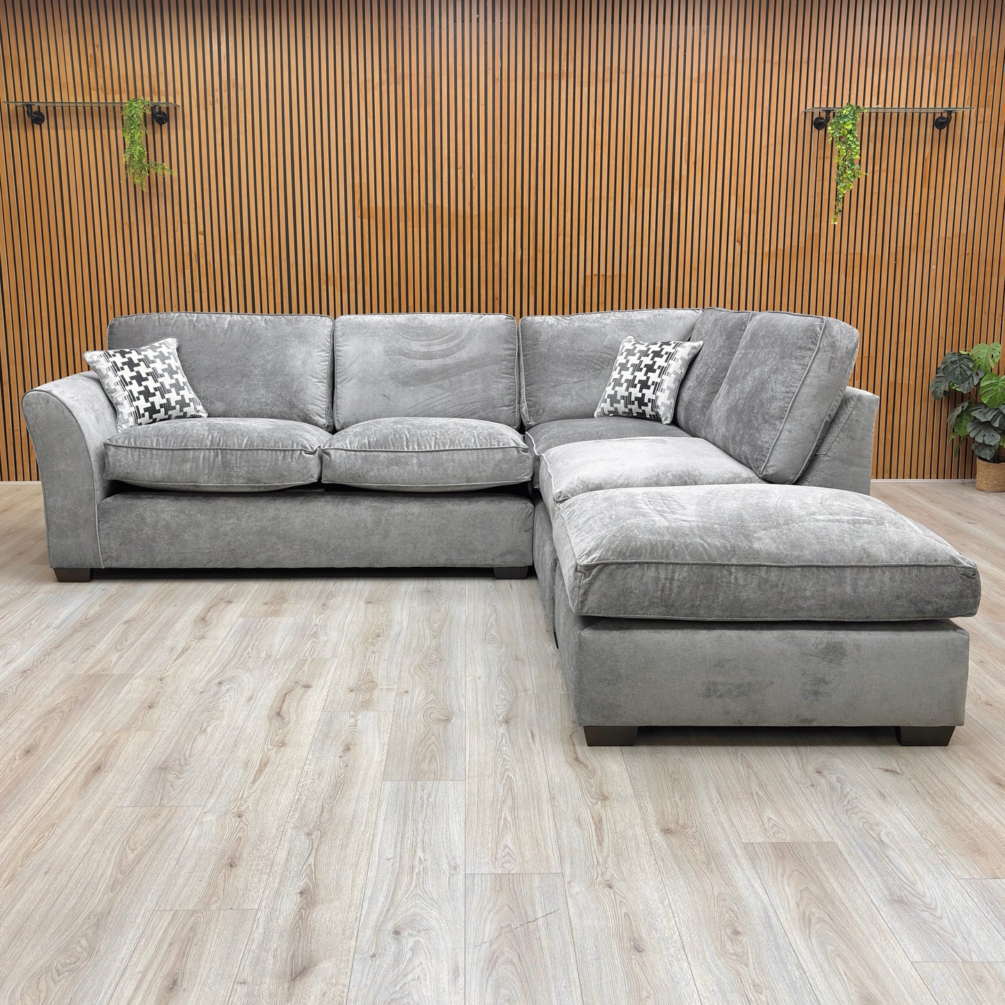 Front view of the Thornbrook ‘Rosie’ right-hand facing chaise corner sofa in Kingston Grey fabric, featuring a modern open-end design and plush scatter cushions.
