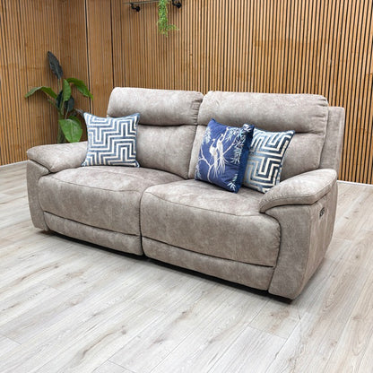 Lifestyle view of the ‘Sloane’ 3-seater sofa with outer seats fully extended, emphasizing the plush padded footrests, supportive bucket seating, and expansive lounging layout.