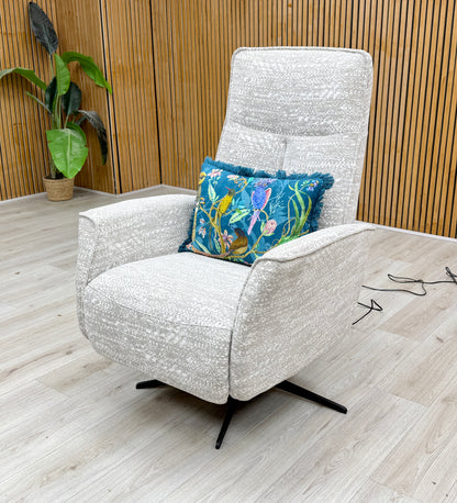 Lifestyle view of the ‘Maribo’ power recliner chair, emphasizing its plush, extended seat cushioning designed for continuous support from head to toe when fully reclined.