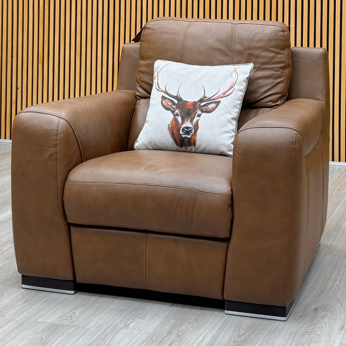 Marinelli Viali bark brown leather power recliner chair against a slatted wooden wall on a light oak floor