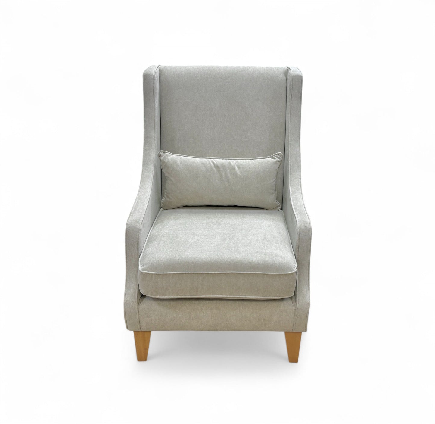 Gray armchair with a pillow on a white background