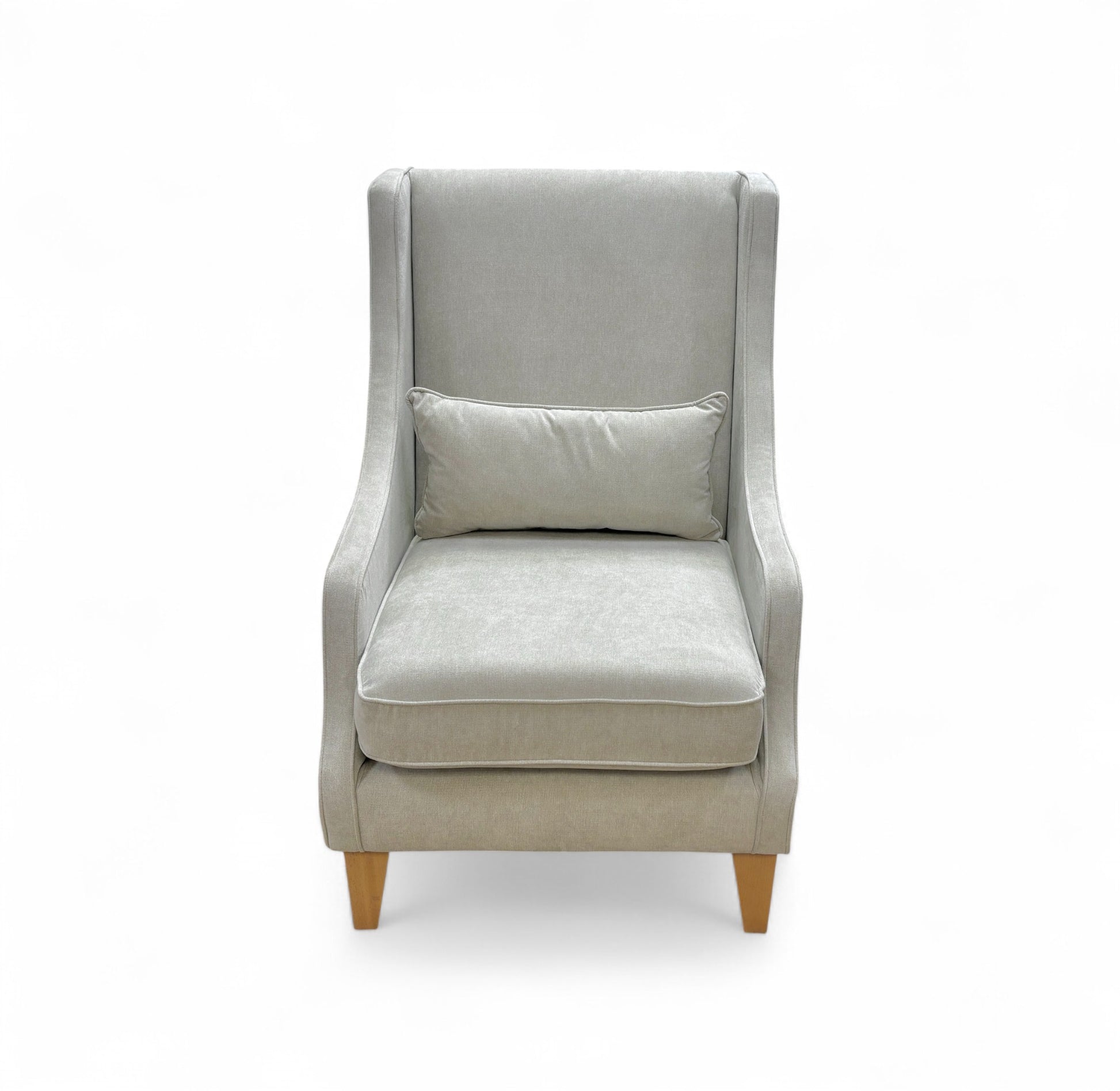 Gray armchair with a pillow on a white background