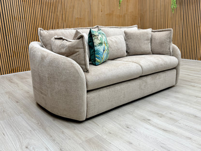 Lifestyle view of portobello 3-seater sofa in stone wicker fabric. A modern, durable, and comfortable living room couch with deep-seated design and supportive cushions.
