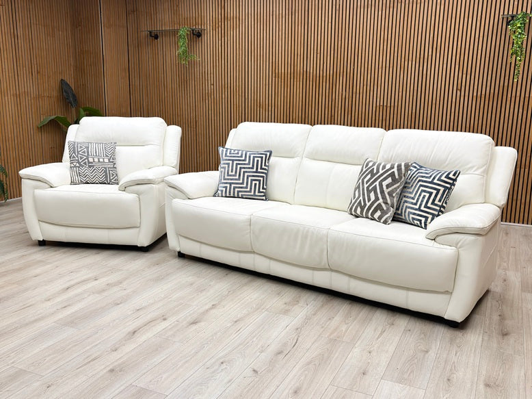 Lifestyle view of the World of Leather Touch Star White leather armchair, featuring a supportive high backrest, generous seating width, and modern tailored finishes.