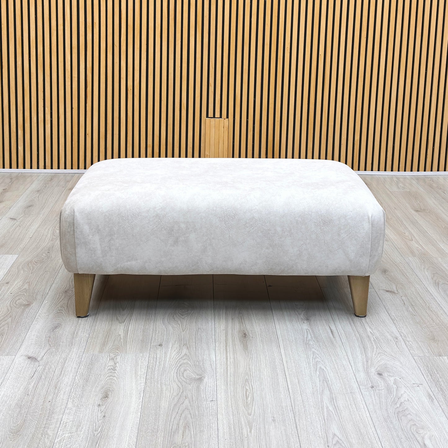 Front View Furniture Village ‘Aura’ contemporary square footstool, beautifully tailored in premium Kenzo cream textured fabric.