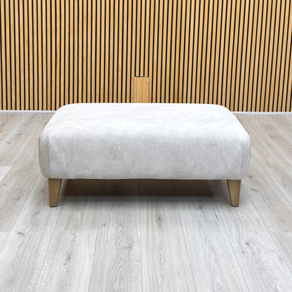 Front View Furniture Village ‘Aura’ contemporary square footstool, beautifully tailored in premium Kenzo cream textured fabric.