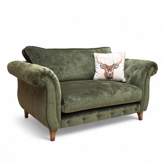 Boutique ‘Palace’ Snuggler Chair in Moss Fabric with a Classic Back is a luxurious addition to any living room