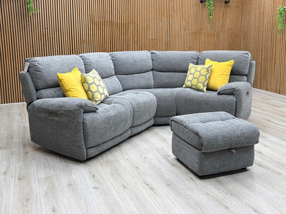 Lifestyle view of three-quarter angled view of the Link fabric corner couch, highlighting the contemporary block silhouette, durable tailored upholstery, and generous family-sized seating.