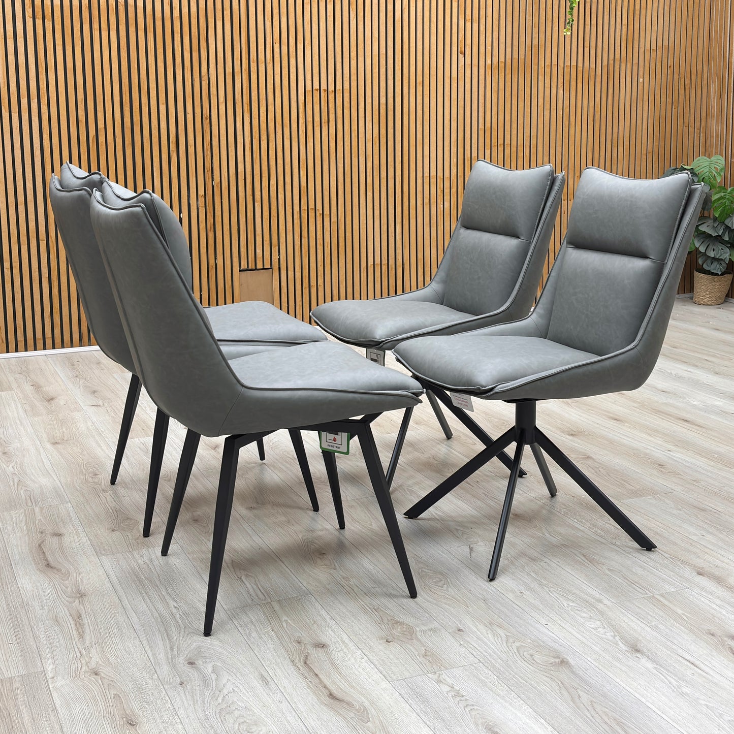 ‘Catalina’ Dark Grey Faux Leather Set of 4 Swivel Dining Chairs