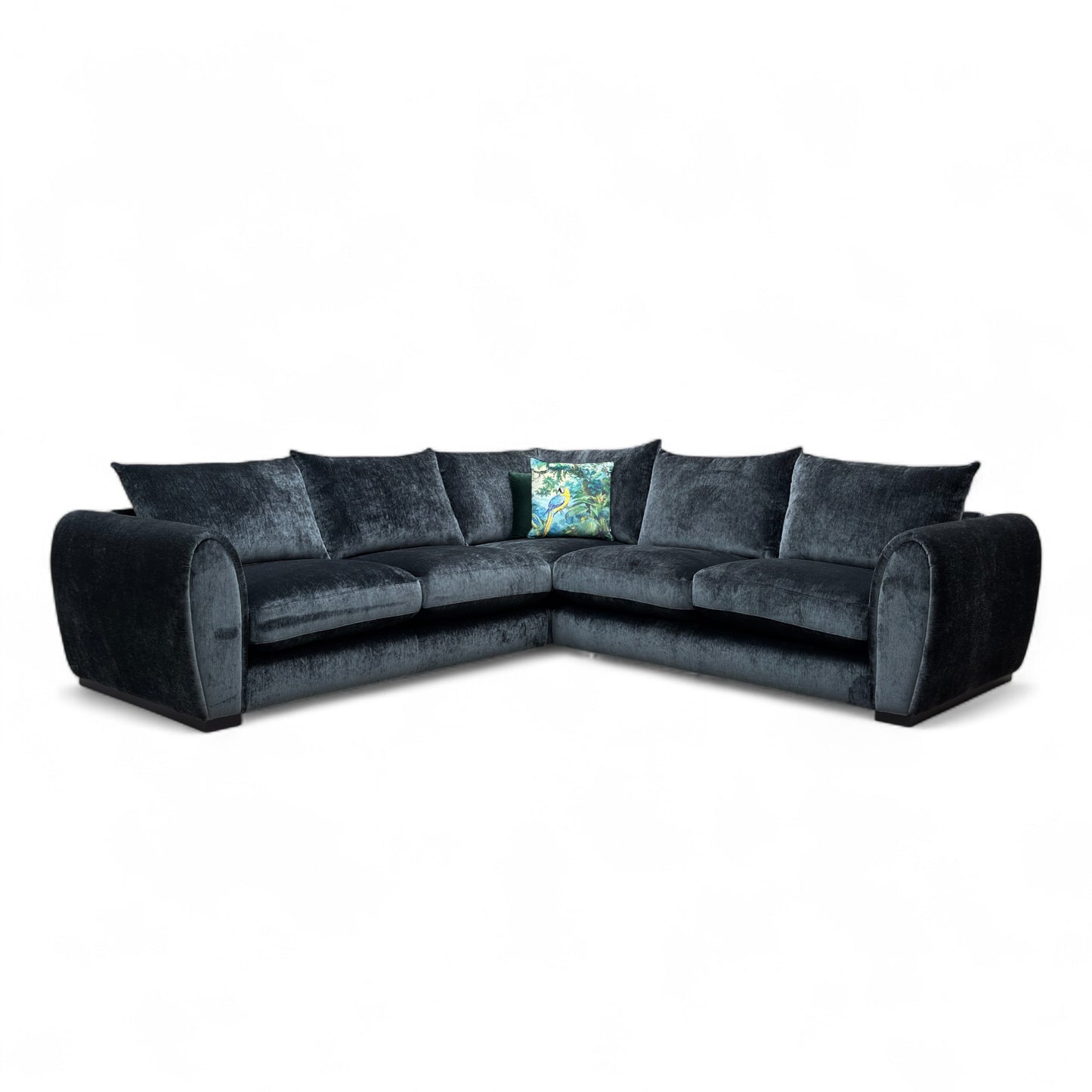 Front-facing view of the Maddison charcoal grey velvet corner sofa, highlighting the deep seats and plush cushions.