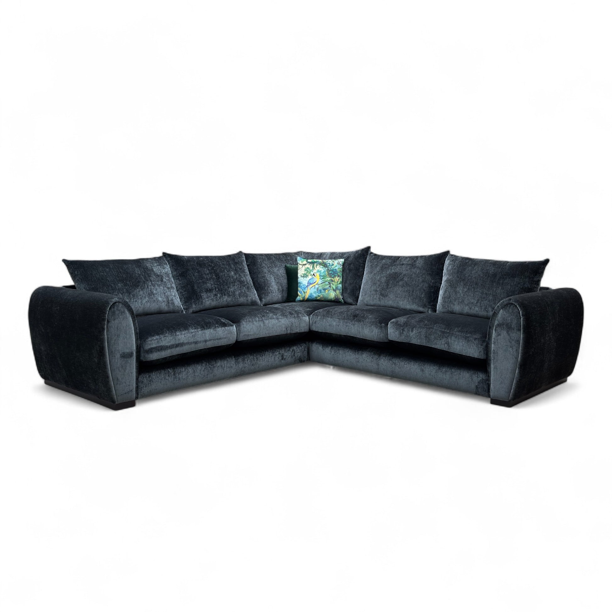 Front-facing view of the Maddison charcoal grey velvet corner sofa, highlighting the deep seats and plush cushions.