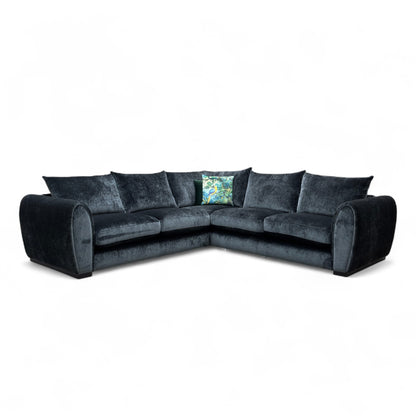Front-facing view of the Maddison charcoal grey velvet corner sofa, highlighting the deep seats and plush cushions.