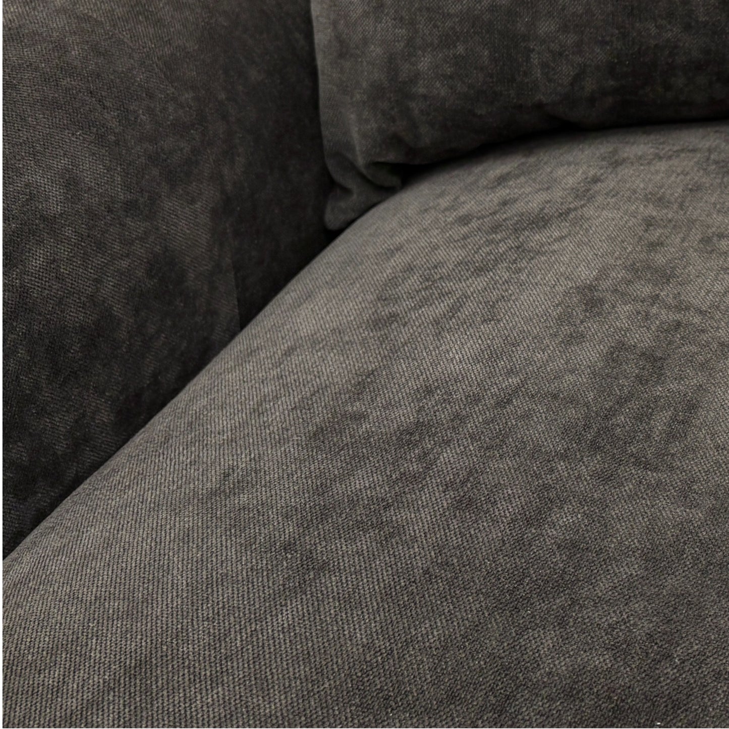 Close-up of a textured gray fabric surface