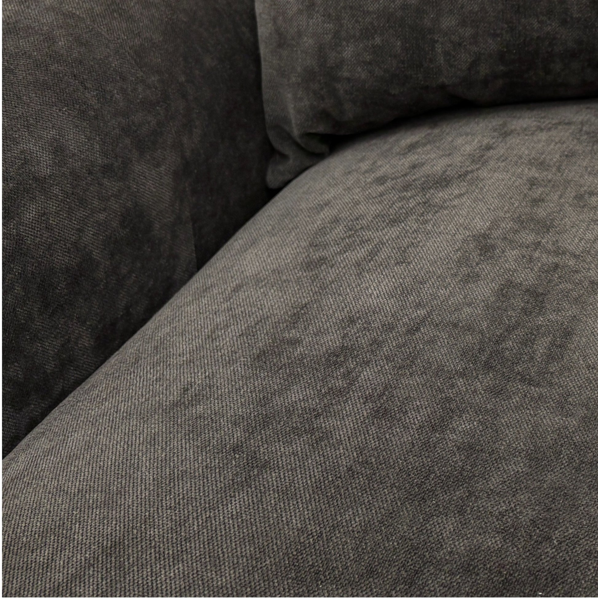 Close-up of a textured gray fabric surface
