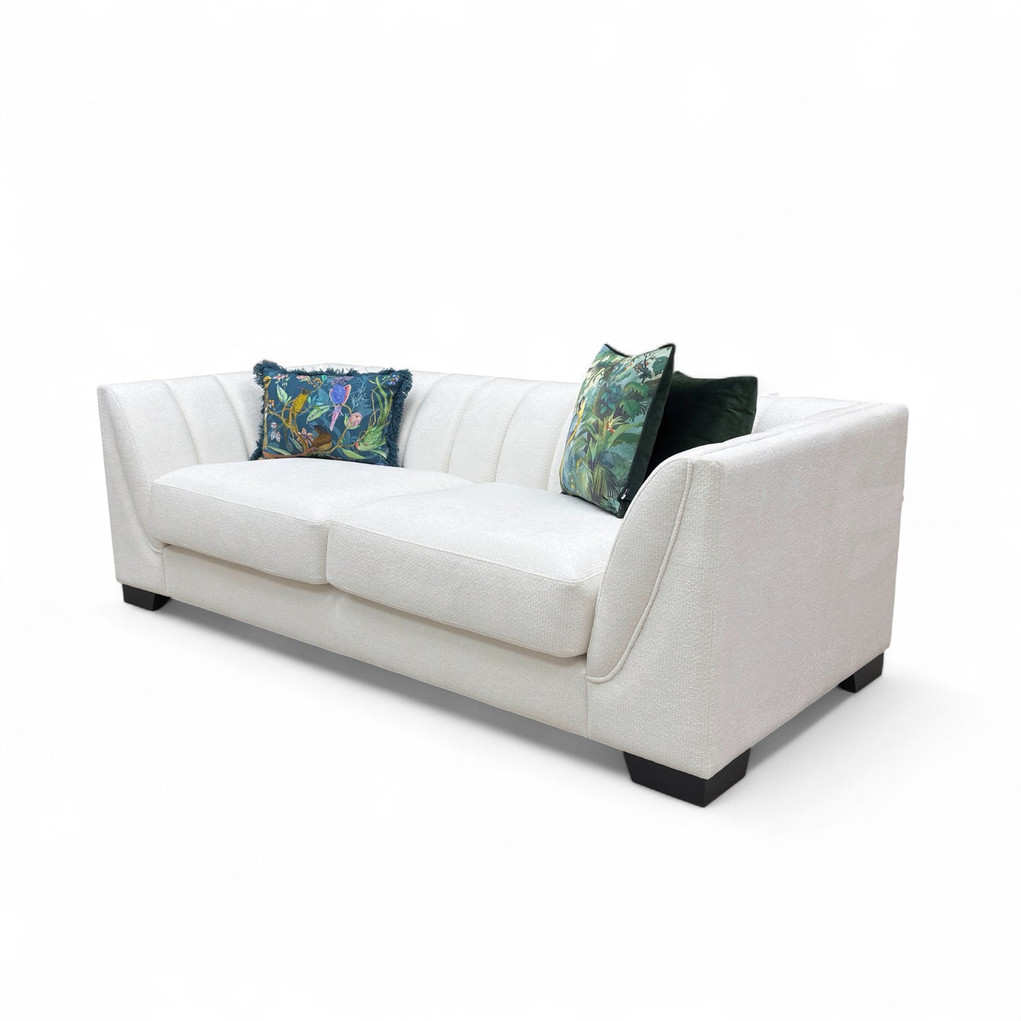 White sofa with decorative pillows on a white background