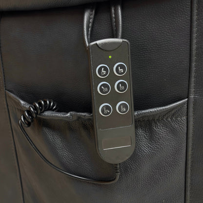 Control panel with buttons on a black leather surface