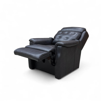 Black leather power recliner with footrest extended
