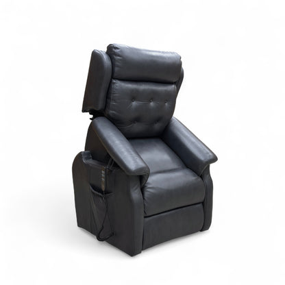 Black leather power recliner with footrest extended