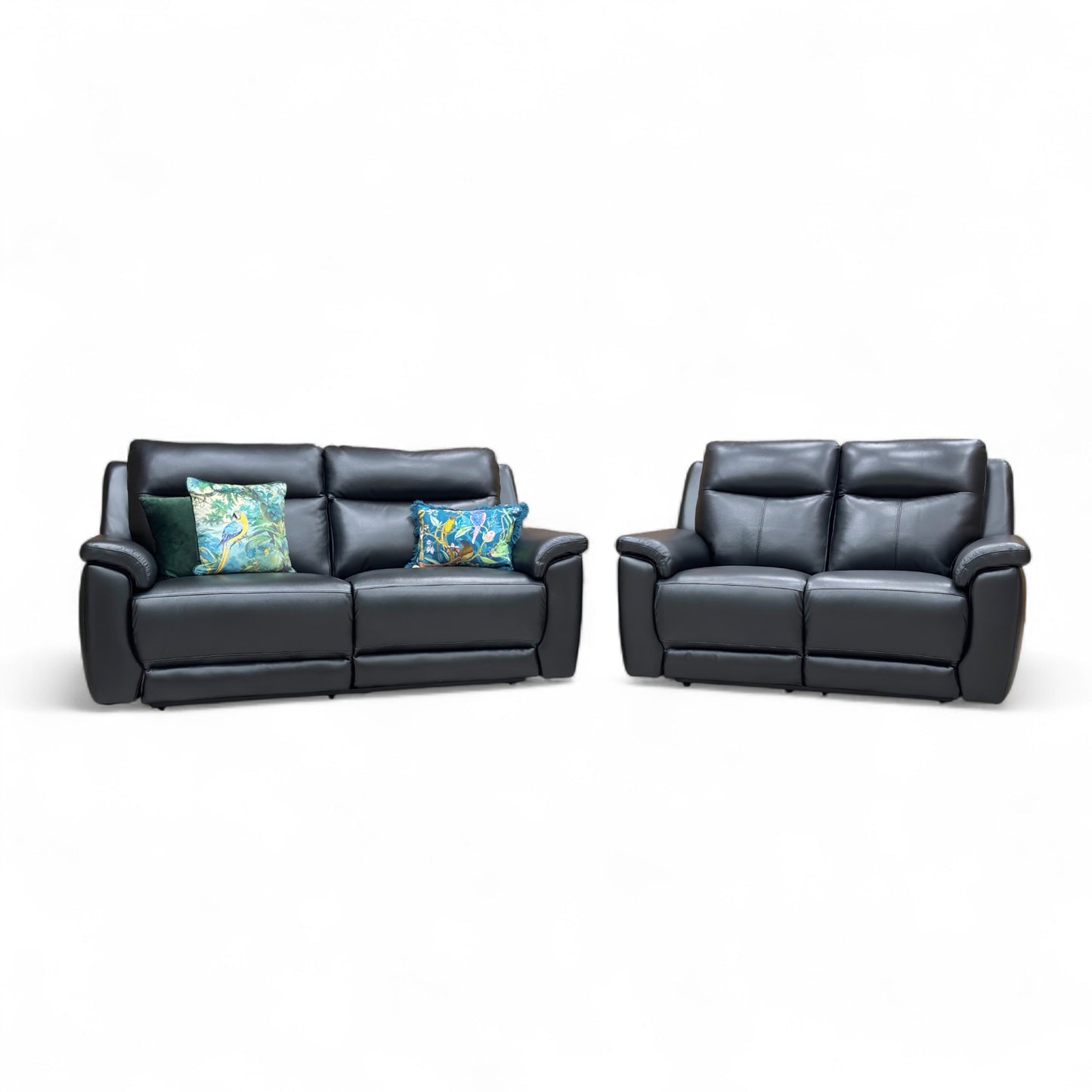 Black leather sofa set with two recliners on a white background
