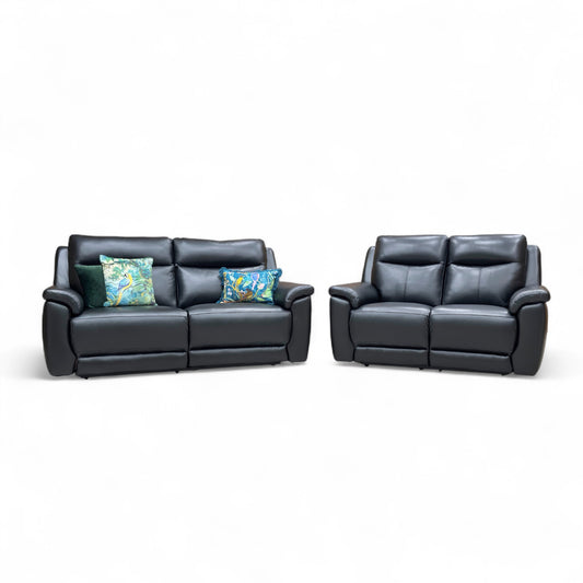 Black leather sofa set with two recliners on a white background