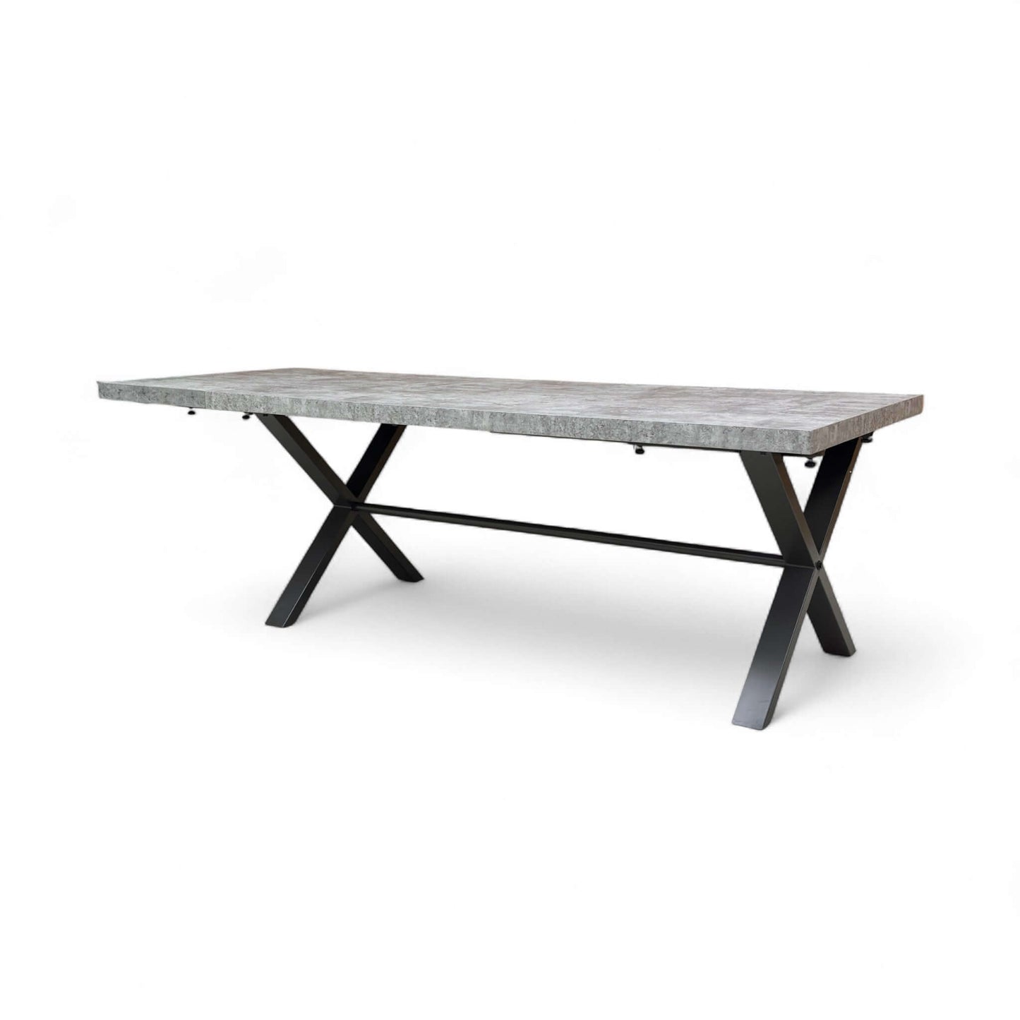Rectangular dining table with concrete top and black metal legs on a white background