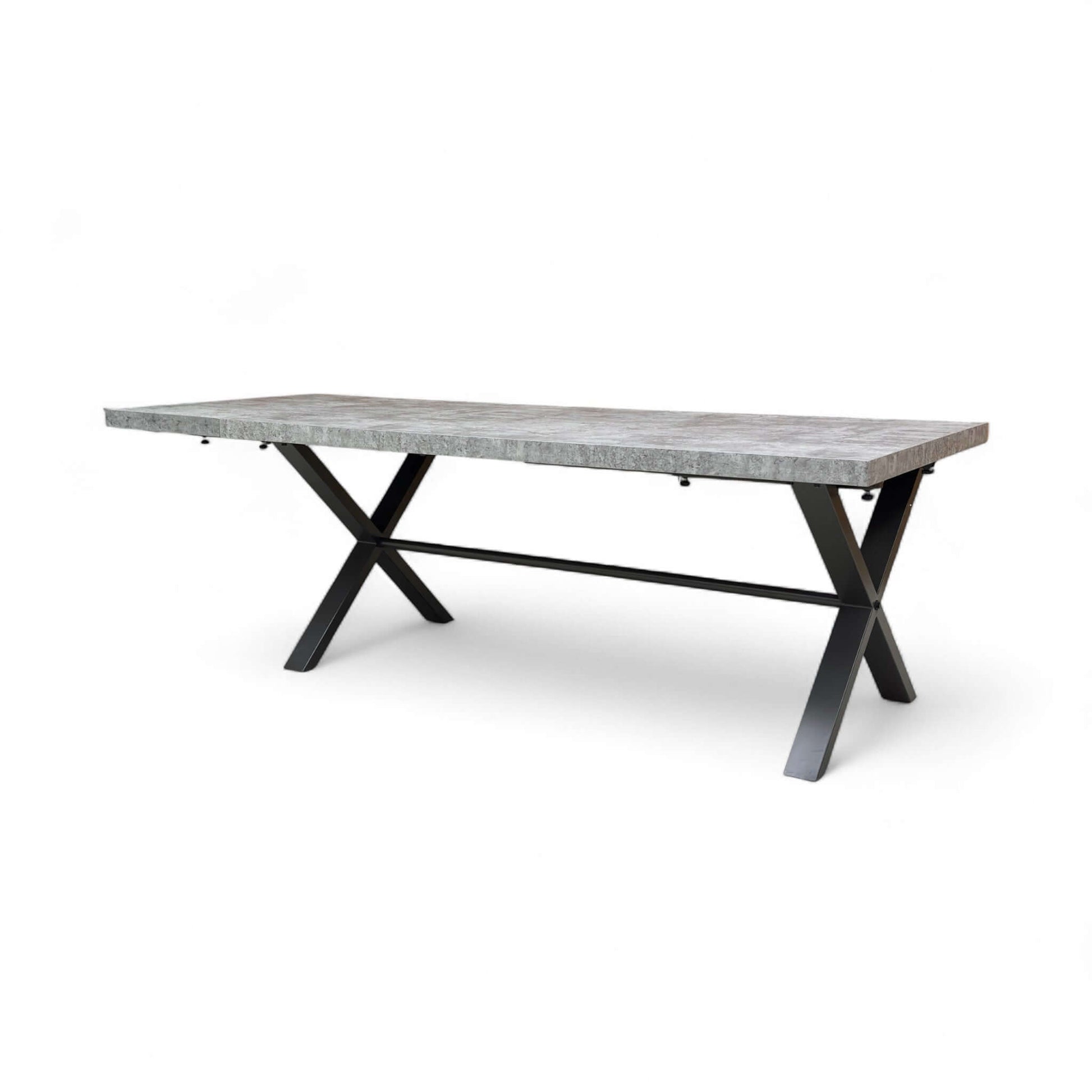 Rectangular dining table with concrete top and black metal legs on a white background
