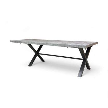 Rectangular dining table with concrete top and black metal legs on a white background
