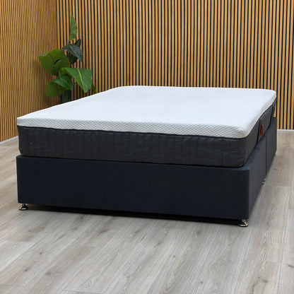 Emma Mattress Original Hypoallergenic Spring Free Foam Mattress - King - lifestyle photo on dark divan base against wood slat wall