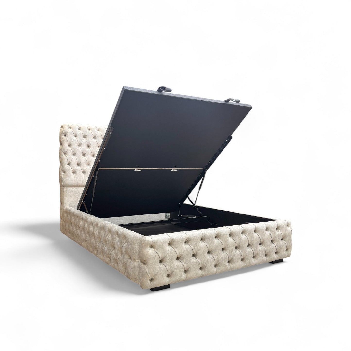 Detailed view of the deep button tufting on the Belford bed's velvet headboard, showcasing its luxurious texture.