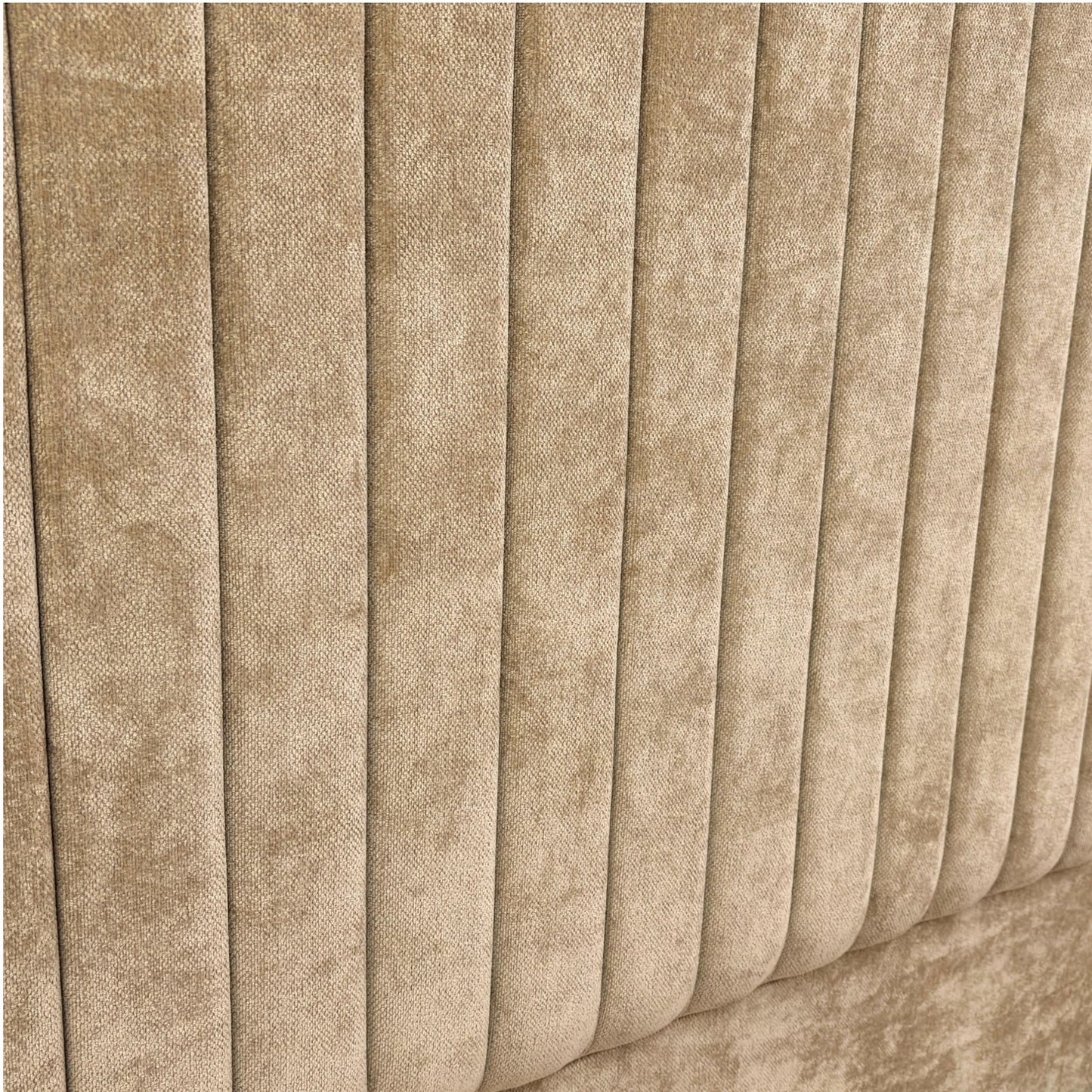 Close-up of pleated beige fabric texture