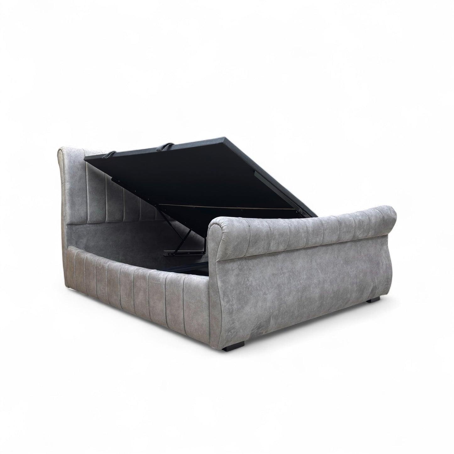 Gray upholstered bed with black tray on a white background