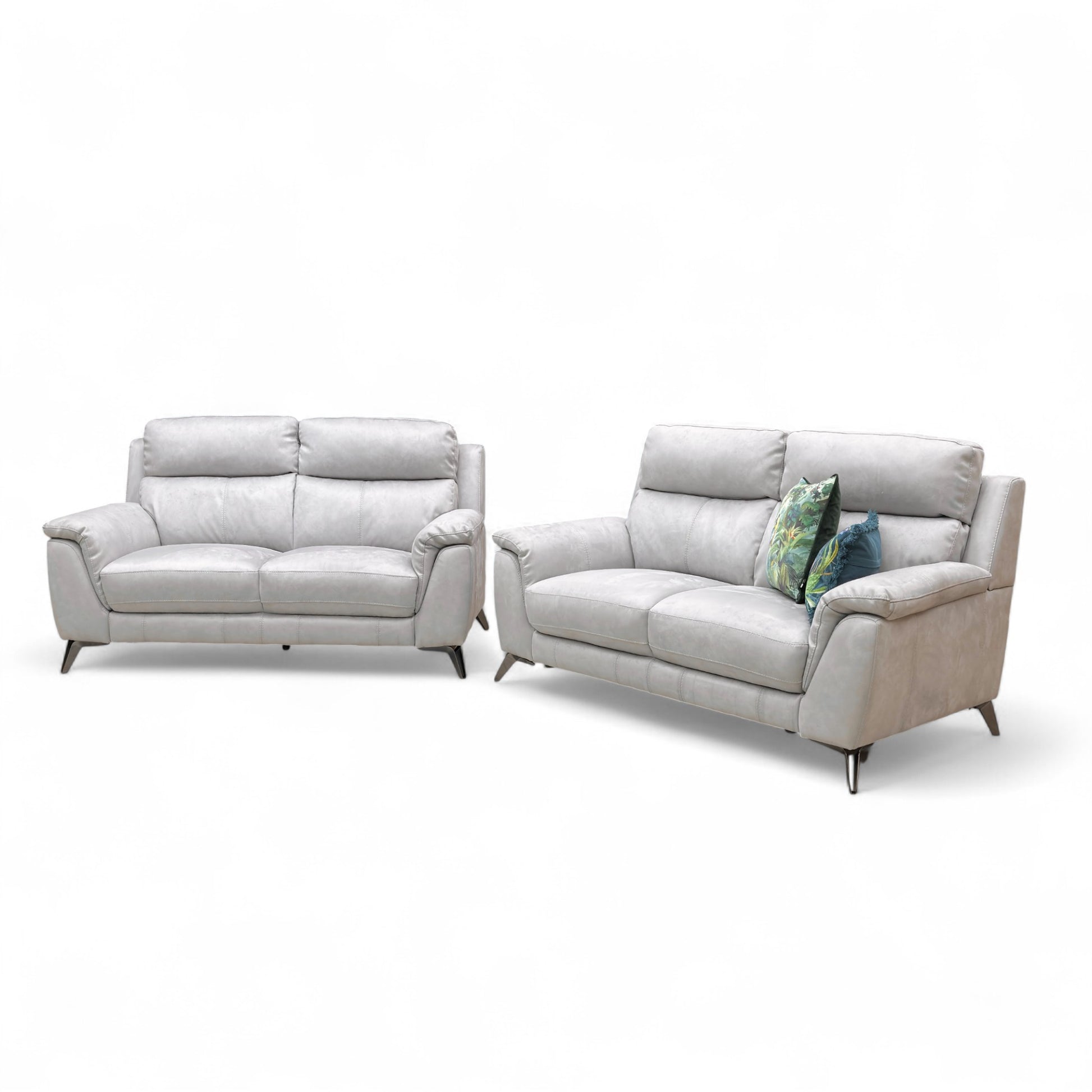 Photo demonstrating the scale of the 2-seater sofas when placed in a room, emphasizing their compact yet roomy design.