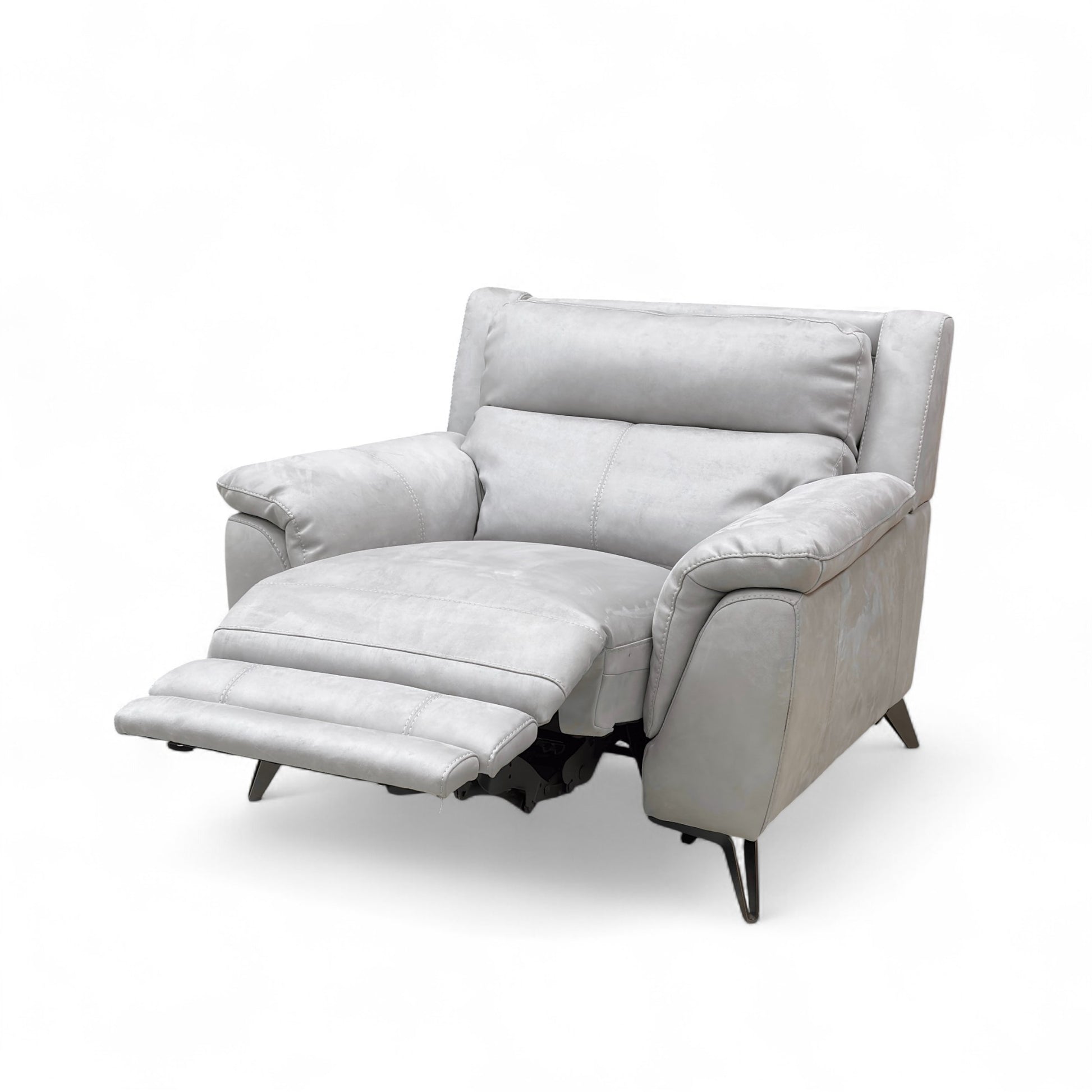 Side profile view of the recliner armchair, emphasizing the high back and plush armrest shape.