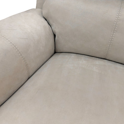 Detailed close-up of the Bluish Grey Suede Fabric texture, showing the stitching and the luxurious fiber-filled back cushion.