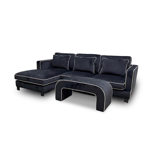 ‘Demure' Black Demure Velvet Left Hand Facing Arm 4 Seater Chaise Sofa + Banquette Footstool