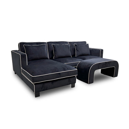 ‘Demure' Black Demure Velvet Left Hand Facing Arm 4 Seater Chaise Sofa + Banquette Footstool