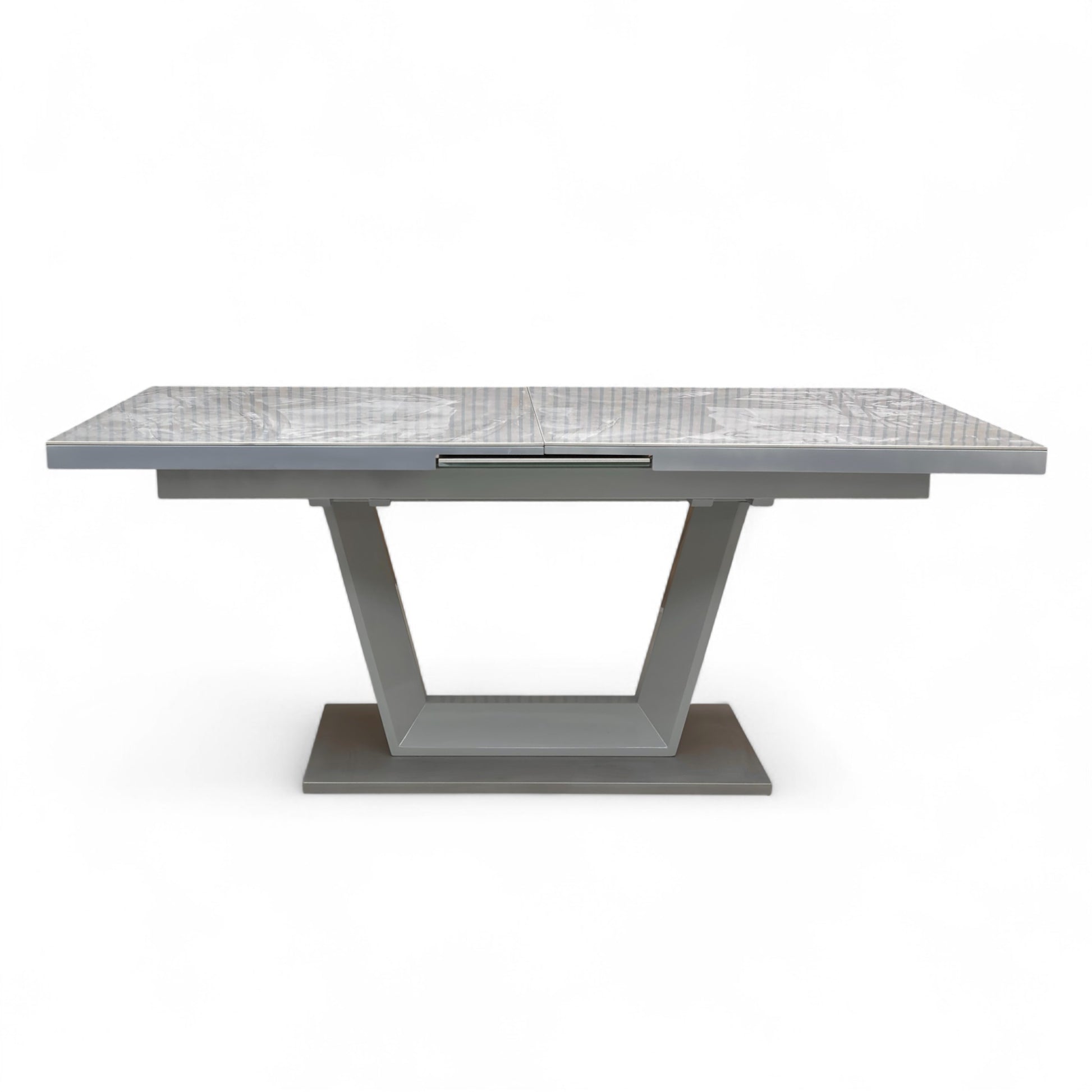 Close-up of the Grigio ceramic tabletop, showcasing the realistic gray and white veining of the marble effect.