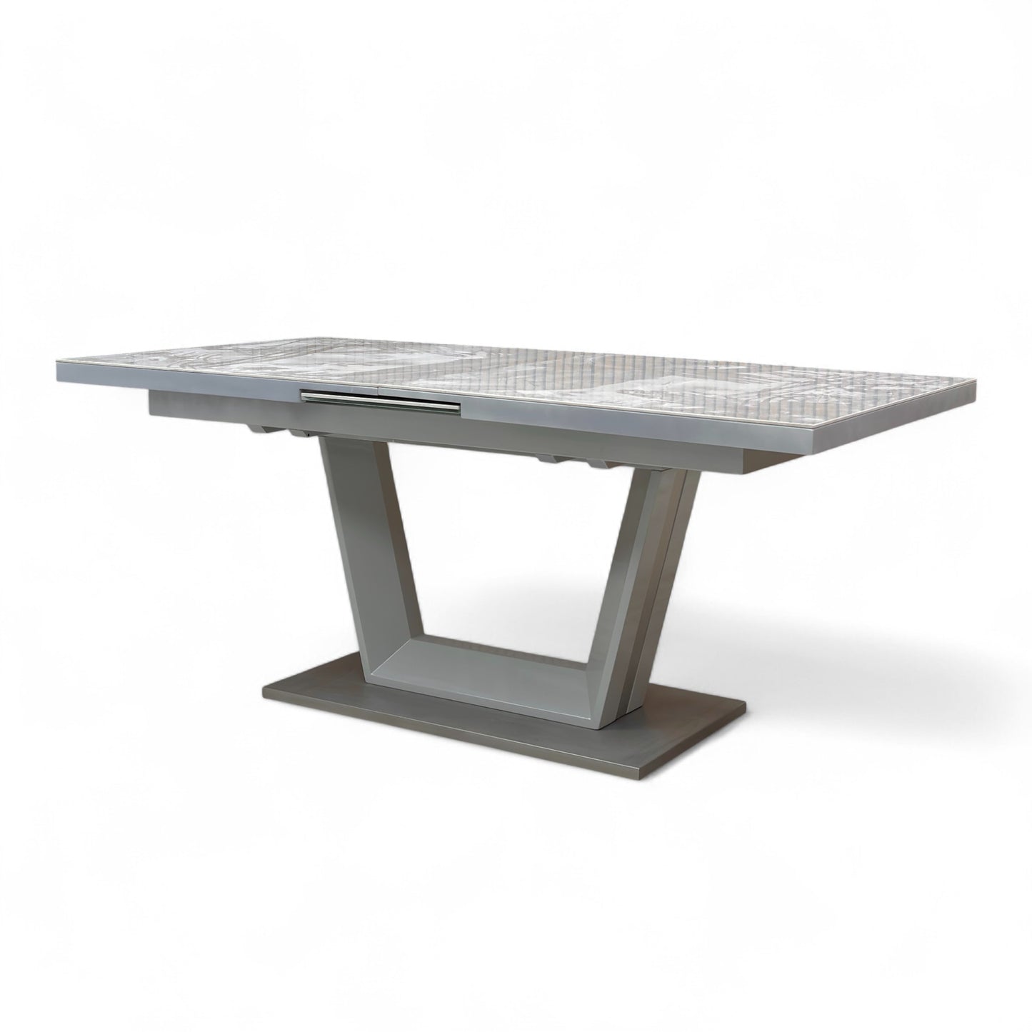 Full view of the Grigio dining table fully extended (to 216 cm), showing the expanded seating capacity for up to 10 people.