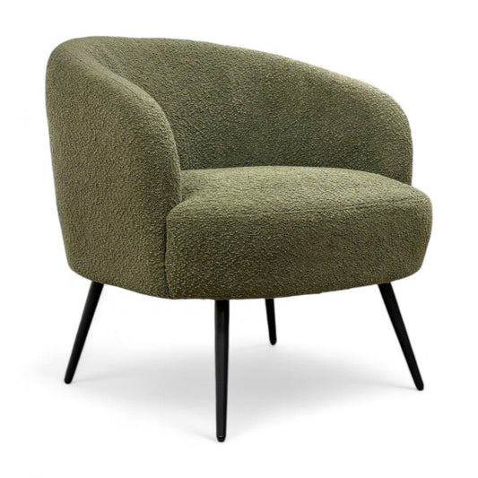 Green armchair with black legs on a white background