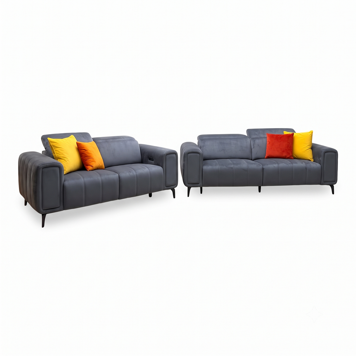 Elphaba granite grey velvet 3 + 2 seater power recliner sofa set upright, angled view with yellow and orange cushions