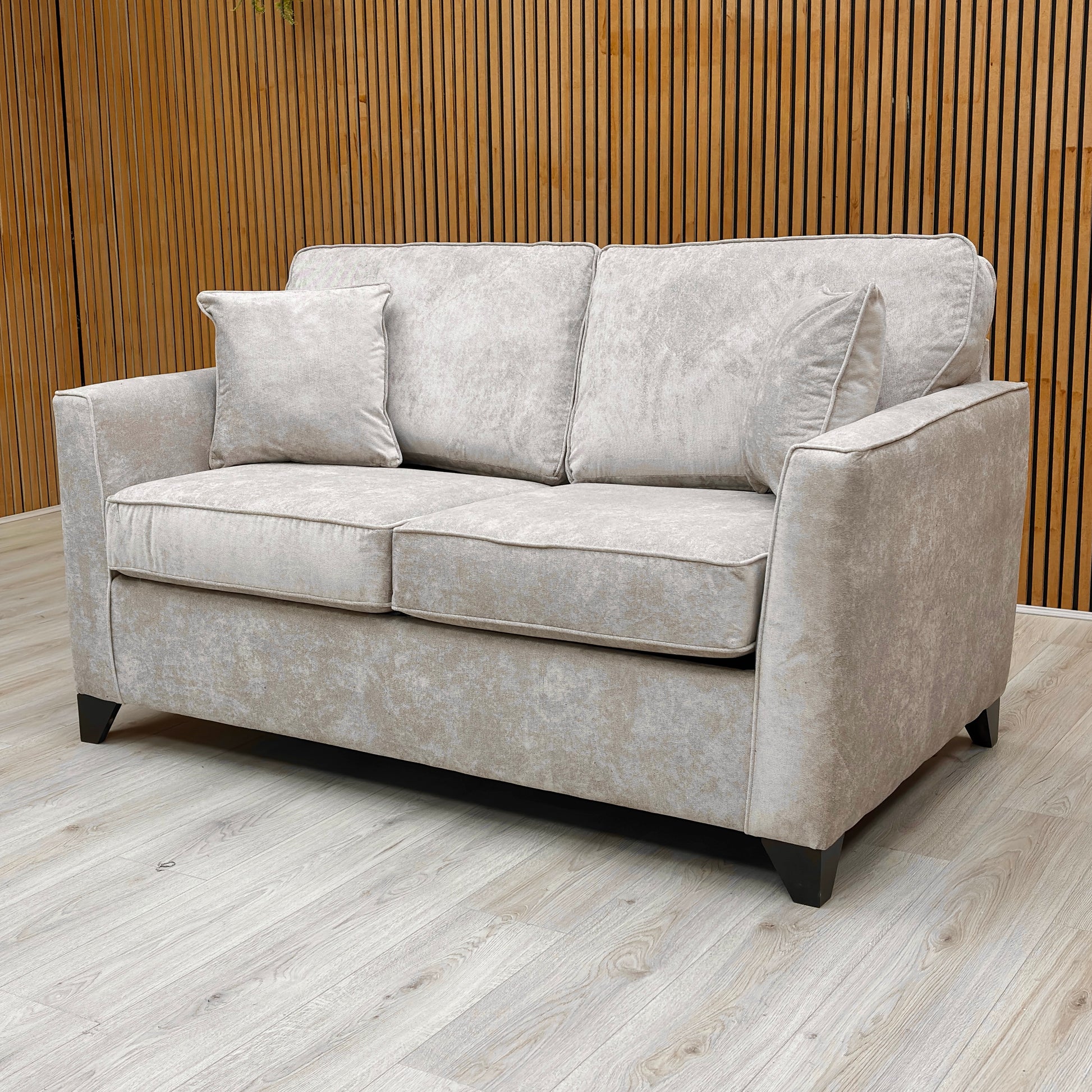 The ‘Smith’ Sofa Bed fully extended into the sleeping position, showing the pull-out metal frame and double-sized mattress.