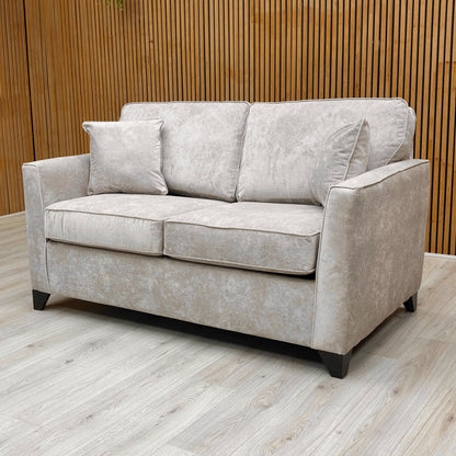 The ‘Smith’ Sofa Bed fully extended into the sleeping position, showing the pull-out metal frame and double-sized mattress.