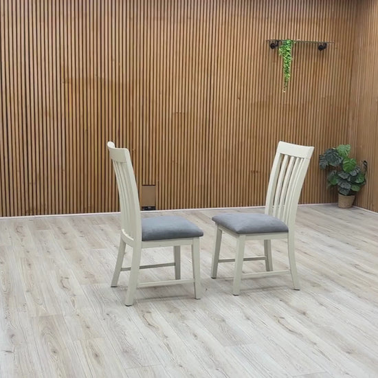 Video Of ‘Hamilton’ contemporary dining chair set, showcasing a pair of matching high-back wooden chairs with elegant Taupe finished legs and a clean, minimalist silhouette.