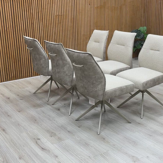 Product video tour of the ‘Mirage’ Neutral Swivel Dining Arm Chairs, demonstrating the smooth rotation mechanism and the high-quality fabric texture.