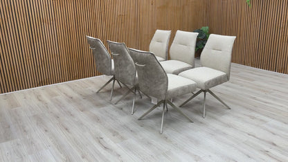 Product video tour of the ‘Mirage’ Neutral Swivel Dining Arm Chairs, demonstrating the smooth rotation mechanism and the high-quality fabric texture.