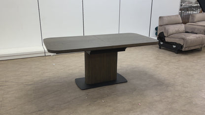 Video demonstration of the Jai dark oak dining table, showcasing the easy-to-use butterfly extension mechanism.