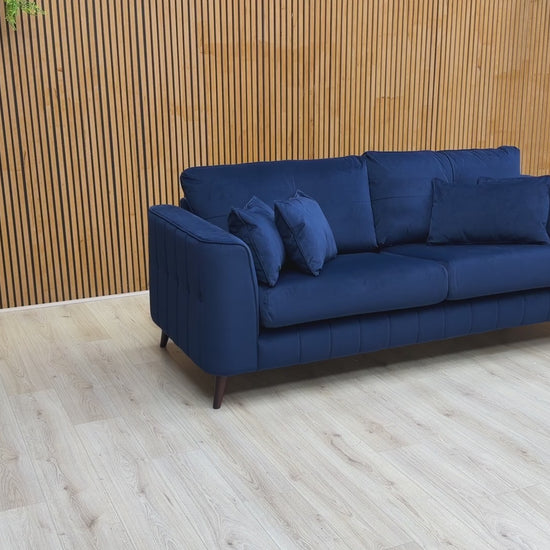 Video tour of the Sofology Remy sofa, providing a close-up look at the rich velvet texture and the sturdy wooden frame.