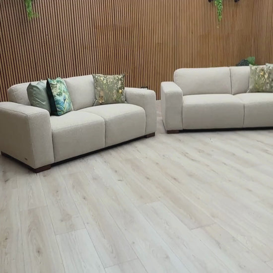 Video Of ‘Michelle Keegan Home Cortes’ contemporary 3-seater and 2-seater sofa suite, beautifully tailored in textured natural cream fabric upholstery.